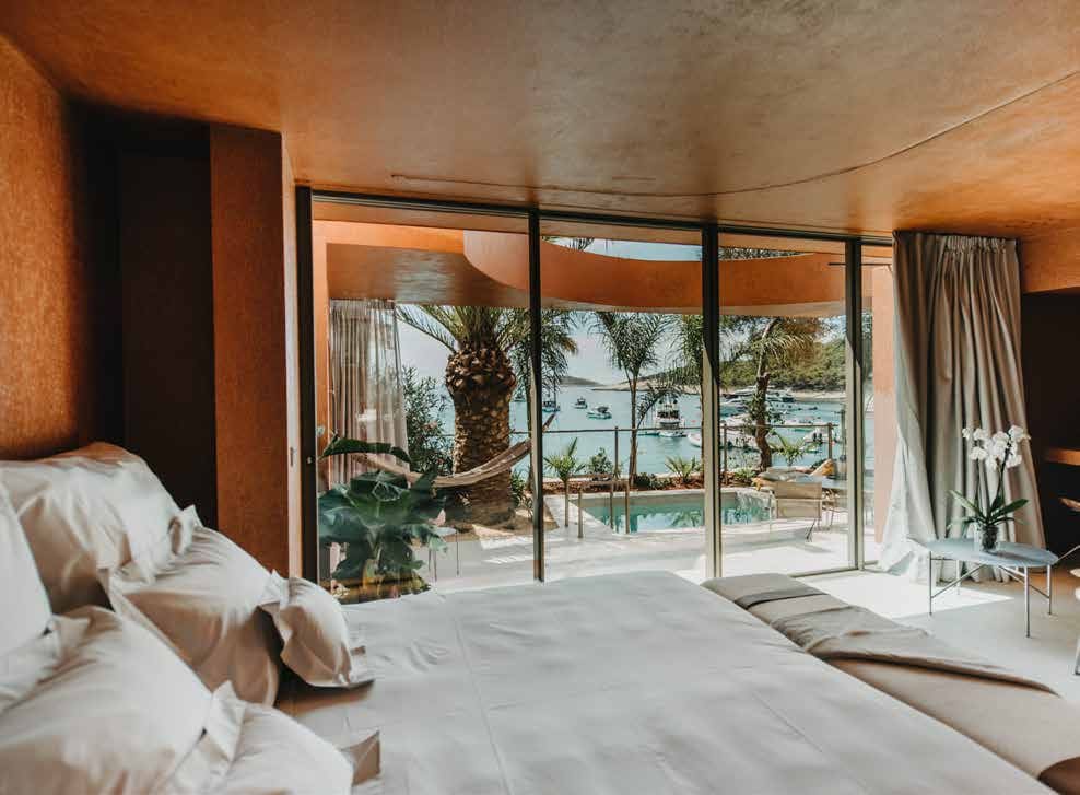 Ein Schlafzimmer mit Meerblick in einer Zori-Residenz, Palmižana